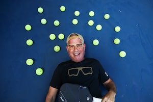 Brad Robins, founder of Kitchen Blockers, a pair of lensless eye protection for pickleball players is photographed on a pickleball court at his home in King City, Ontario, Wednesday, August 19, 2026.  (Cole Burston/The Globe and Mail)